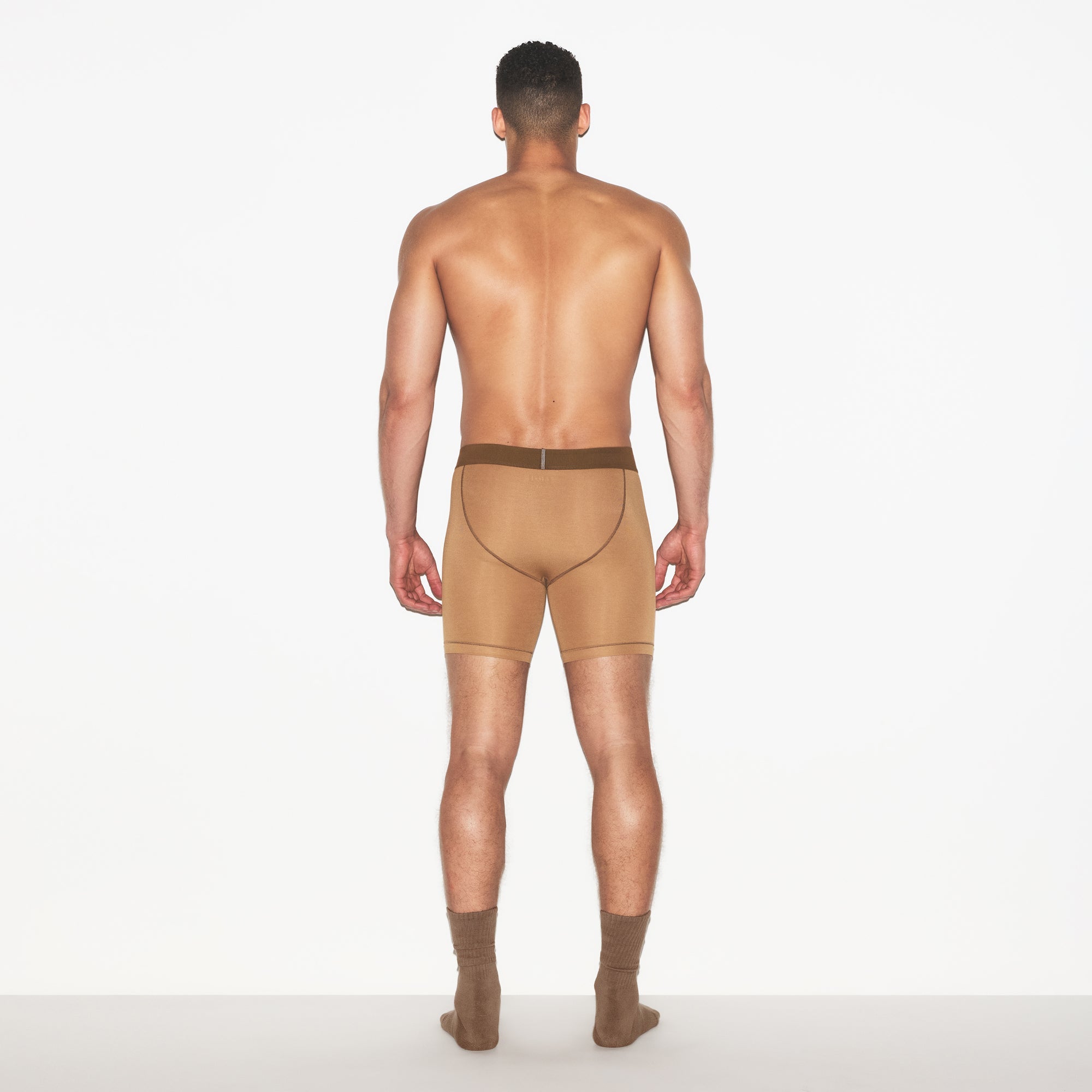 SKIMS COTTON MENS 5 INCH BOXER BRIEF 3-PACK | RUSSET MULTI ON A MODEL FRONT VIEW | FOCUS: 0.0, 1.0, 0.9
