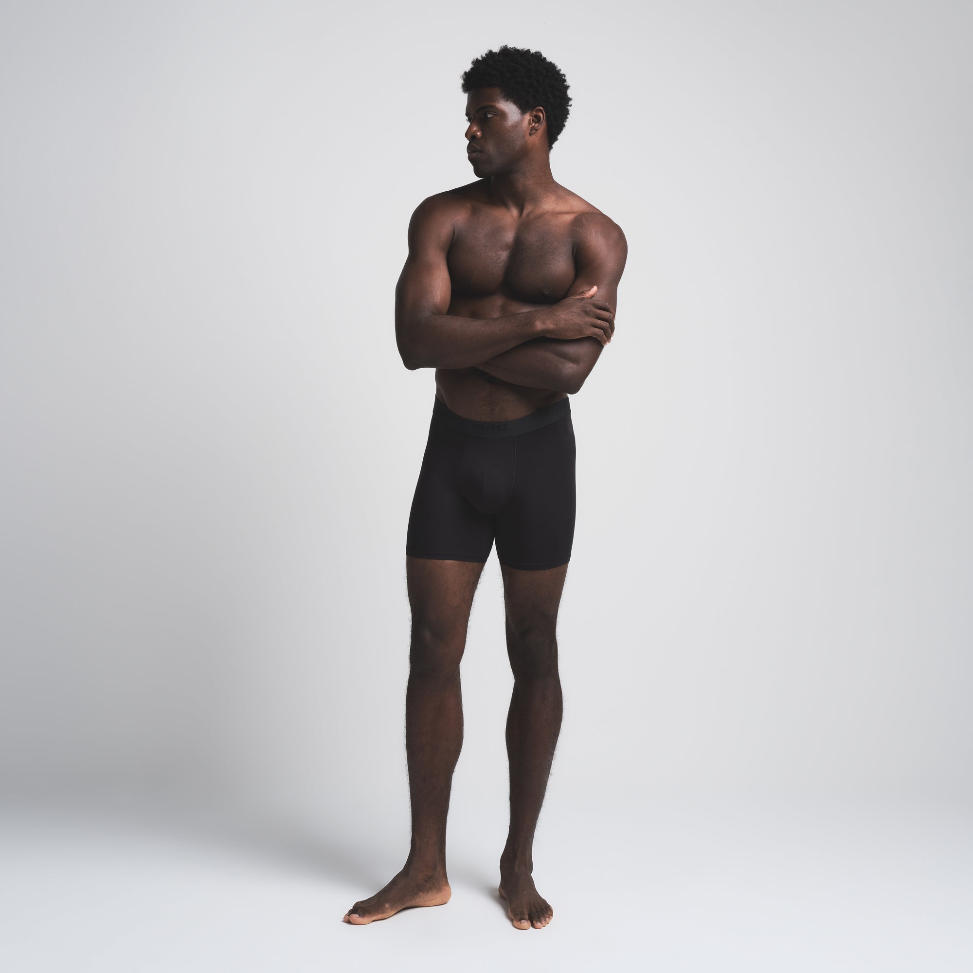 SKIMS STRETCH MENS 5" BOXER BRIEF 5-PACK | OBSIDIAN ON A MODEL FRONT VIEW