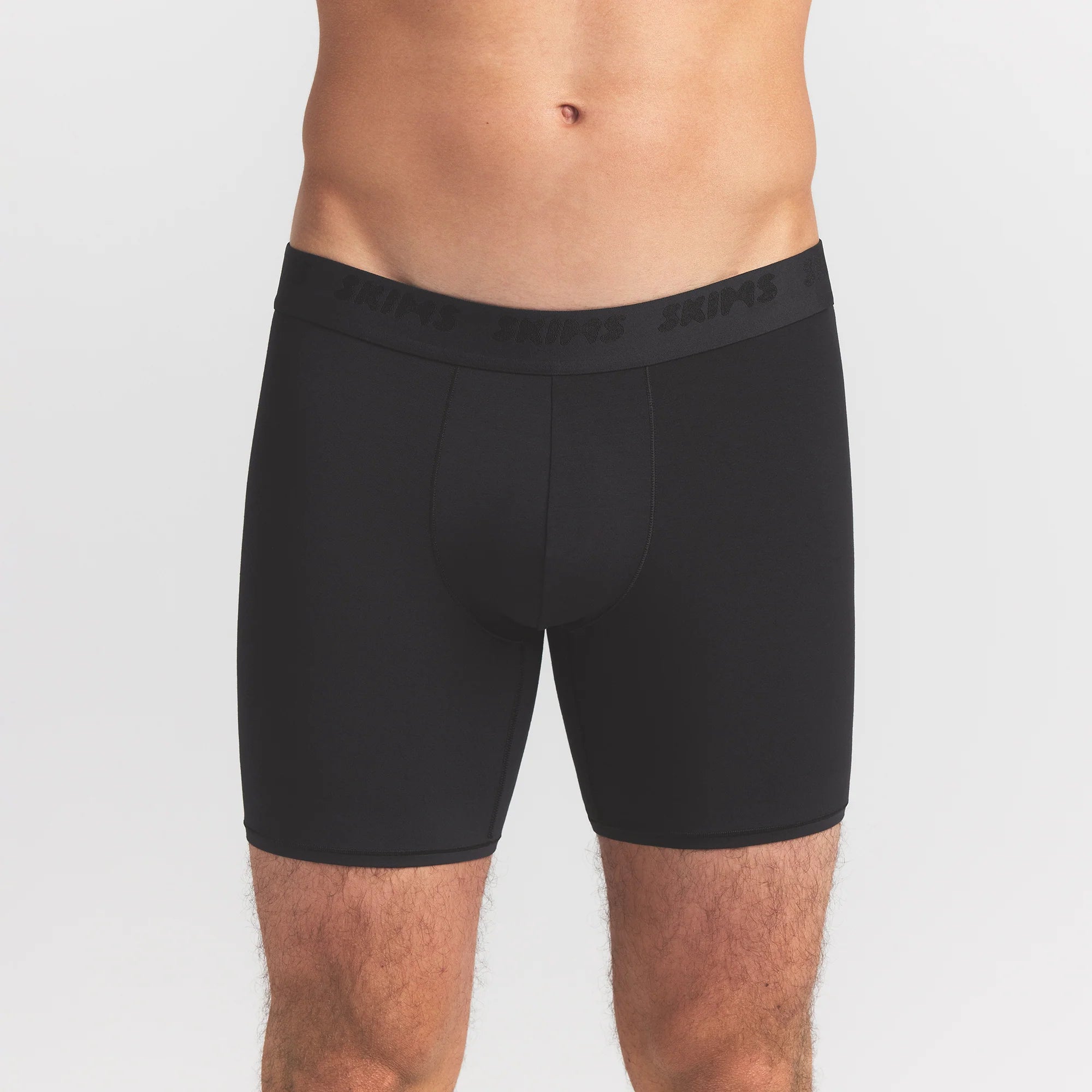 SKIMS STRETCH MENS 5" BOXER BRIEF 5-PACK | RAVEN CURRANT MULTI ON A MODEL FRONT VIEW @ | FOCUS: 0.0, 1.0, 0.9