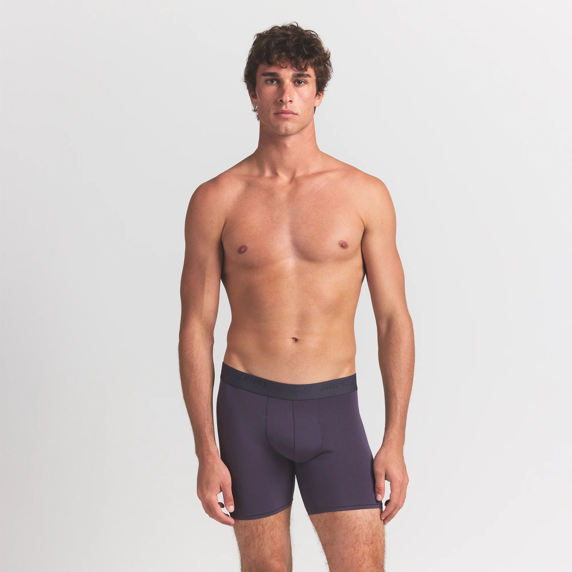 SKIMS STRETCH MENS 5" BOXER BRIEF 5-PACK | RAVEN CURRANT MULTI ON A MODEL FRONT VIEW @ | FOCUS: 0.0, 1.0, 0.9