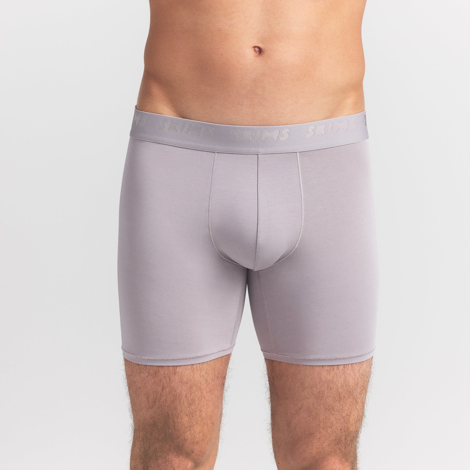 SKIMS STRETCH MENS 5" BOXER BRIEF 5-PACK | RAVEN CURRANT MULTI ON A MODEL FRONT VIEW @ | FOCUS: 0.0, 1.0, 0.9
