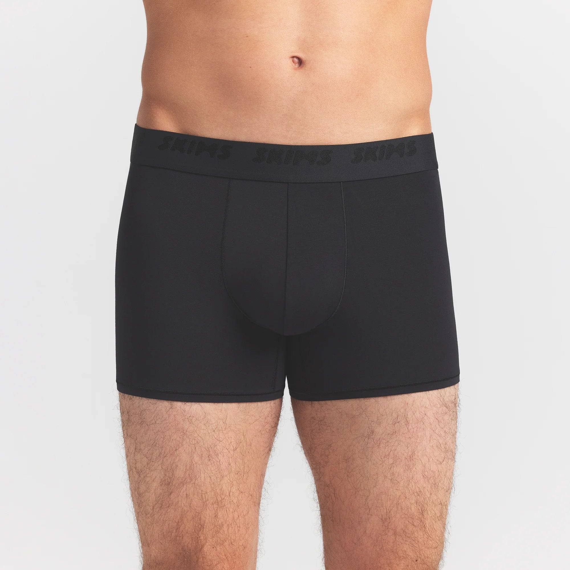 SKIMS STRETCH MENS 3" BOXER BRIEF 5-PACK | RAVEN CURRANT MULTI ON A MODEL FRONT VIEW @ | FOCUS: 0.0, 1.0, 0.9