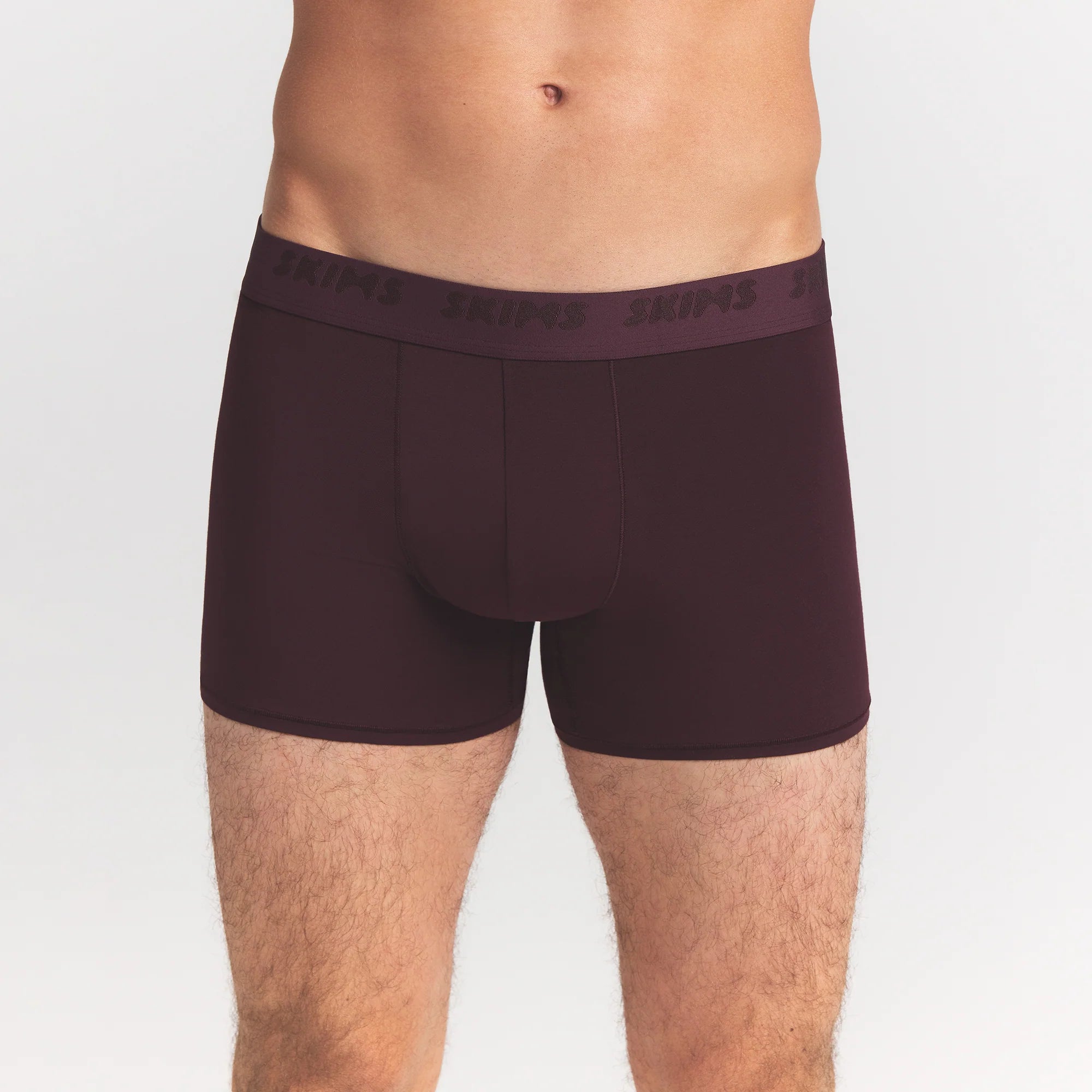 SKIMS STRETCH MENS 3" BOXER BRIEF 5-PACK | RAVEN CURRANT MULTI ON A MODEL FRONT VIEW @ | FOCUS: 0.0, 1.0, 0.9
