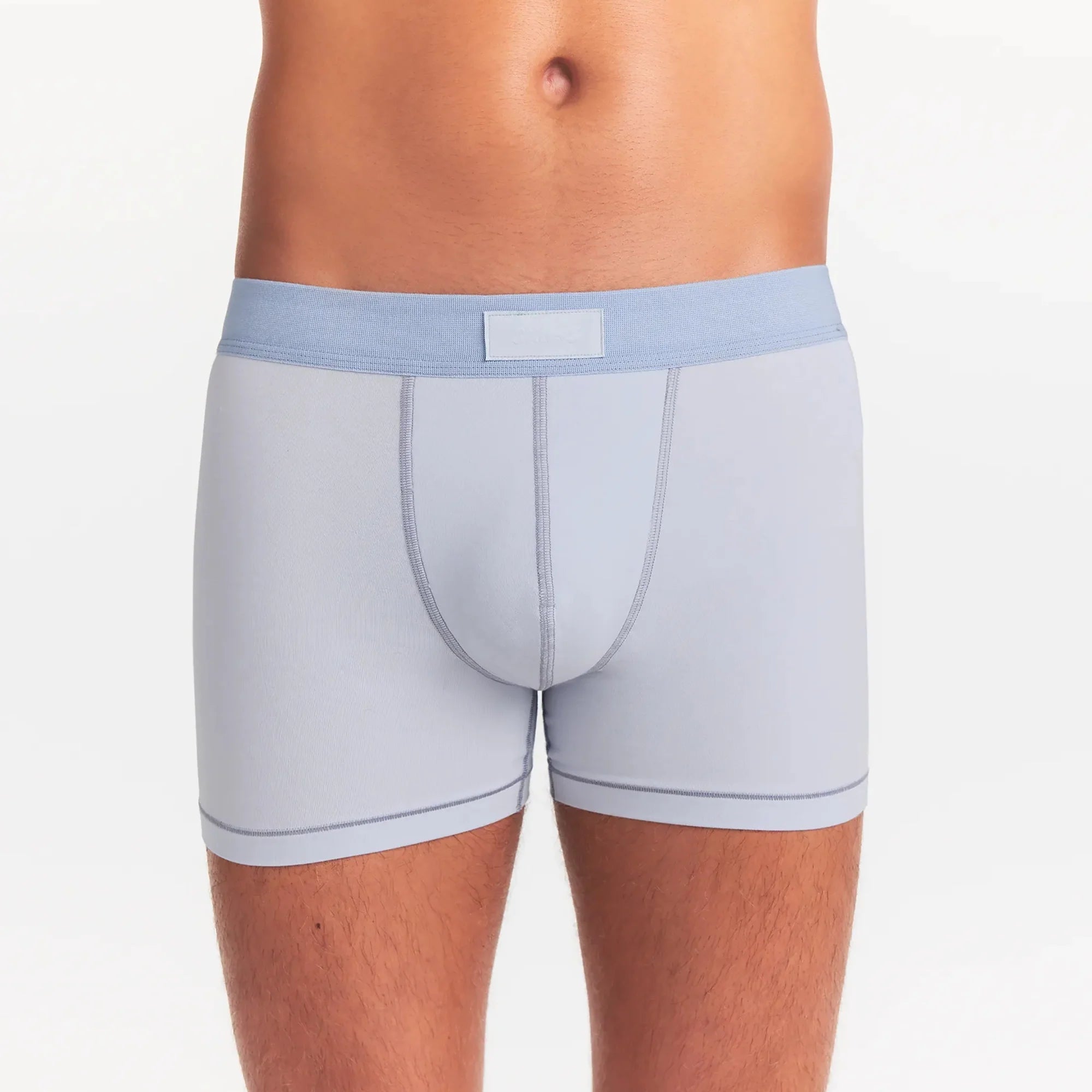 SKIMS COTTON MENS 3" BOXER BRIEF 5-PACK | ATMOSPHERE MULTI ON A MODEL FRONT VIEW