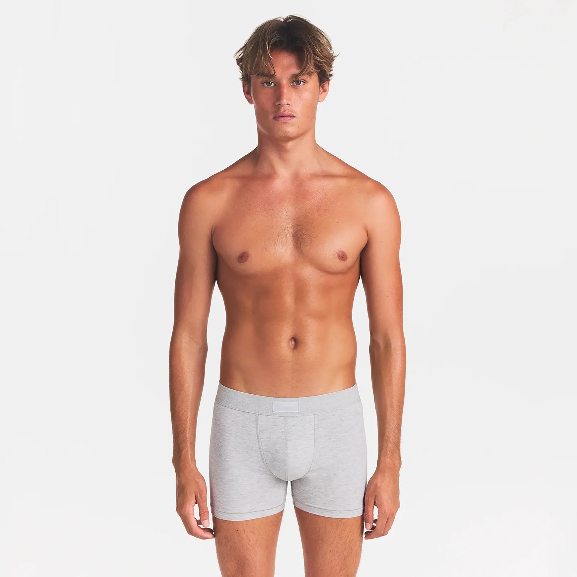 SKIMS COTTON MENS 3" BOXER BRIEF 5-PACK | ATMOSPHERE MULTI ON A MODEL FRONT VIEW
