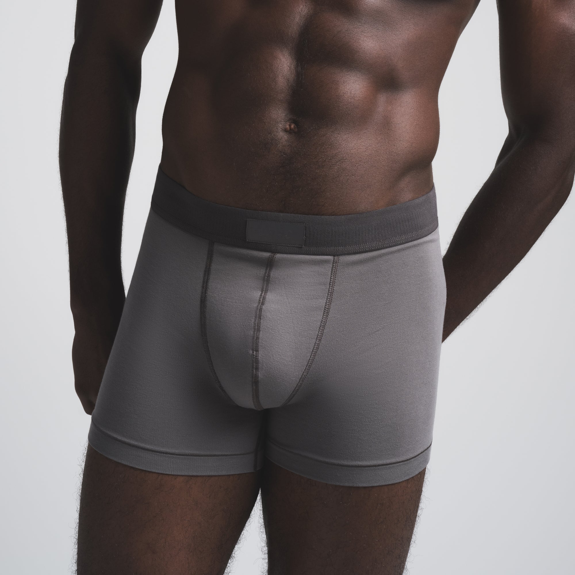 SKIMS COTTON MENS 3" BOXER BRIEF | SIENNA (MENS BOXERS) FLAT ON A WHITE BACKGROUND | FLT