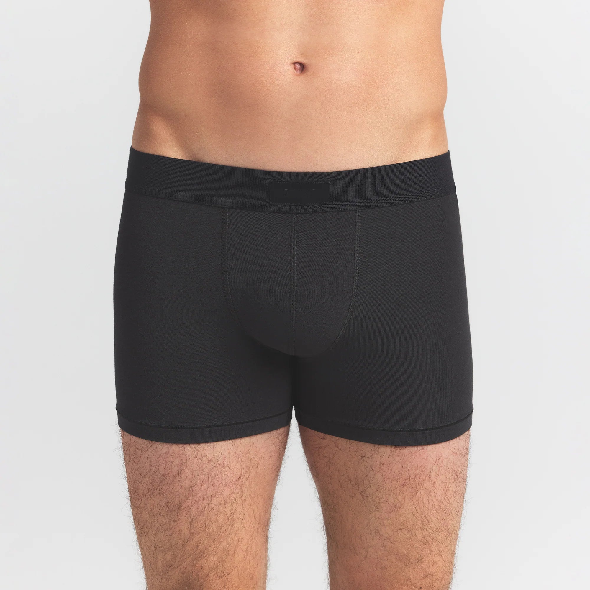 SKIMS COTTON MENS 3" BOXER BRIEF 5-PACK | VERDANT SKY MULTI ON A MODEL FRONT VIEW @ | FOCUS: 0.0, 1.0, 0.9