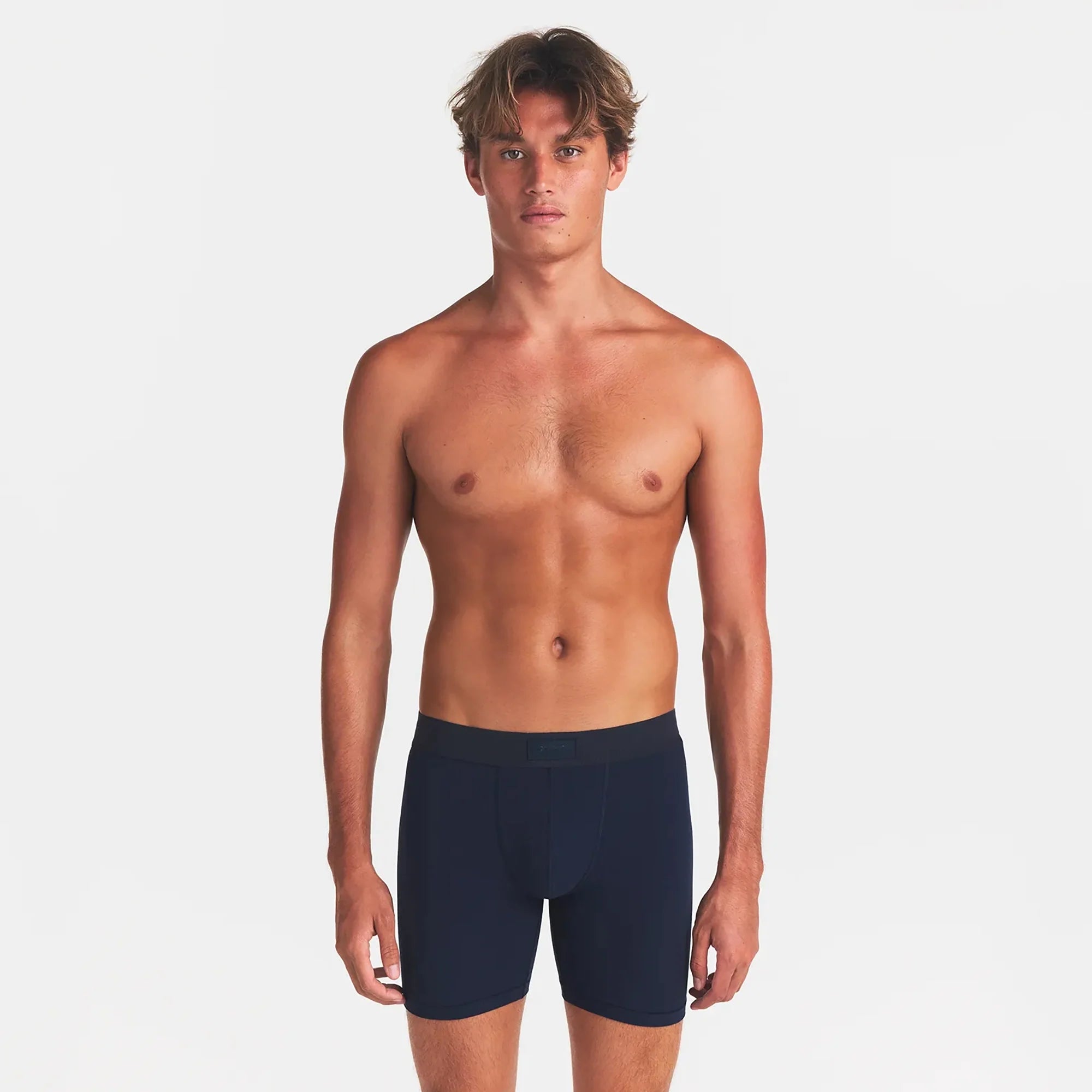 SKIMS COTTON MENS 5" BOXER BRIEF 5-PACK | ATMOSPHERE MULTI ON A MODEL FRONT VIEW