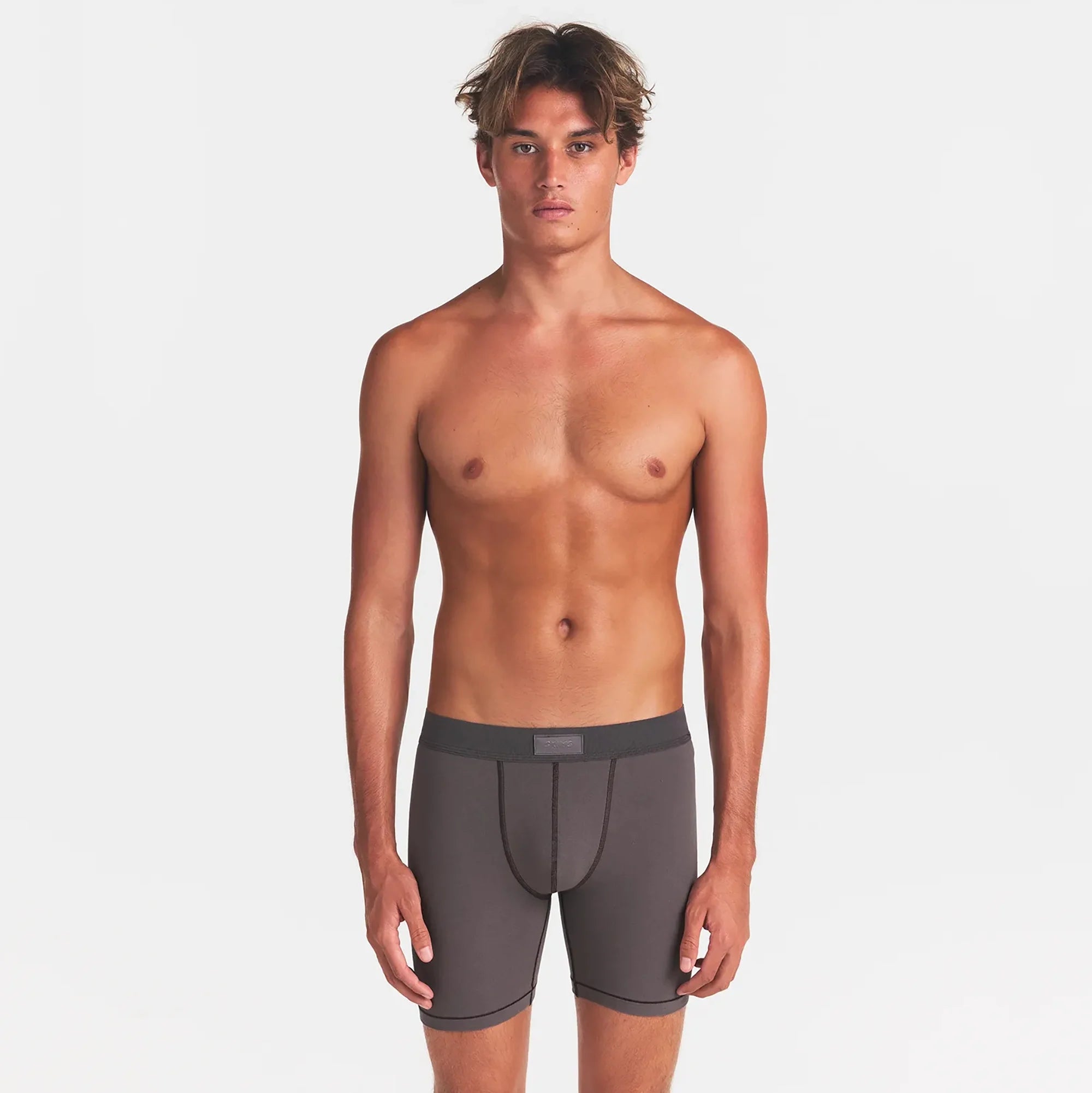 SKIMS COTTON MENS 5" BOXER BRIEF 5-PACK | ATMOSPHERE MULTI ON A MODEL FRONT VIEW
