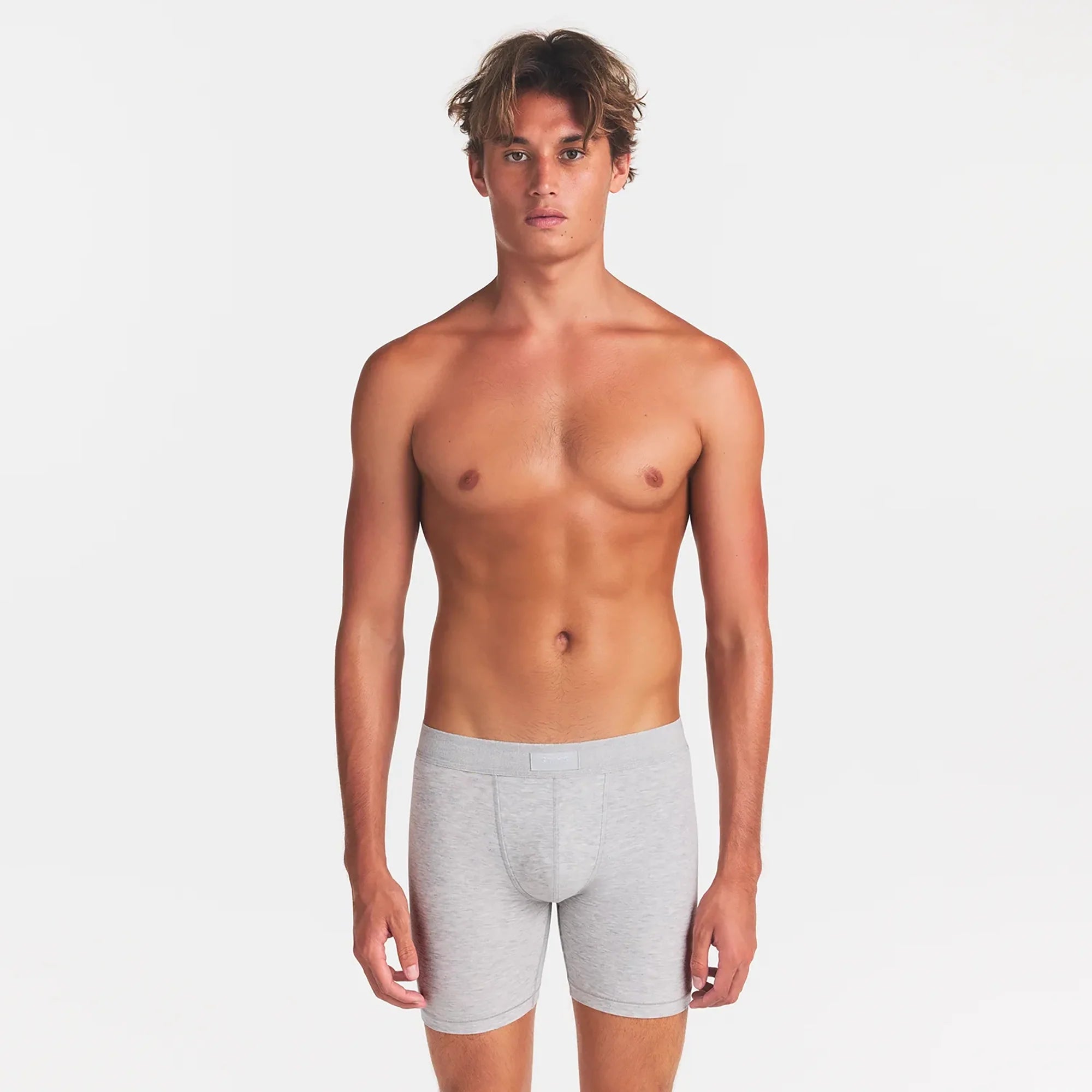 SKIMS COTTON MENS 5" BOXER BRIEF 5-PACK | ATMOSPHERE MULTI ON A MODEL FRONT VIEW