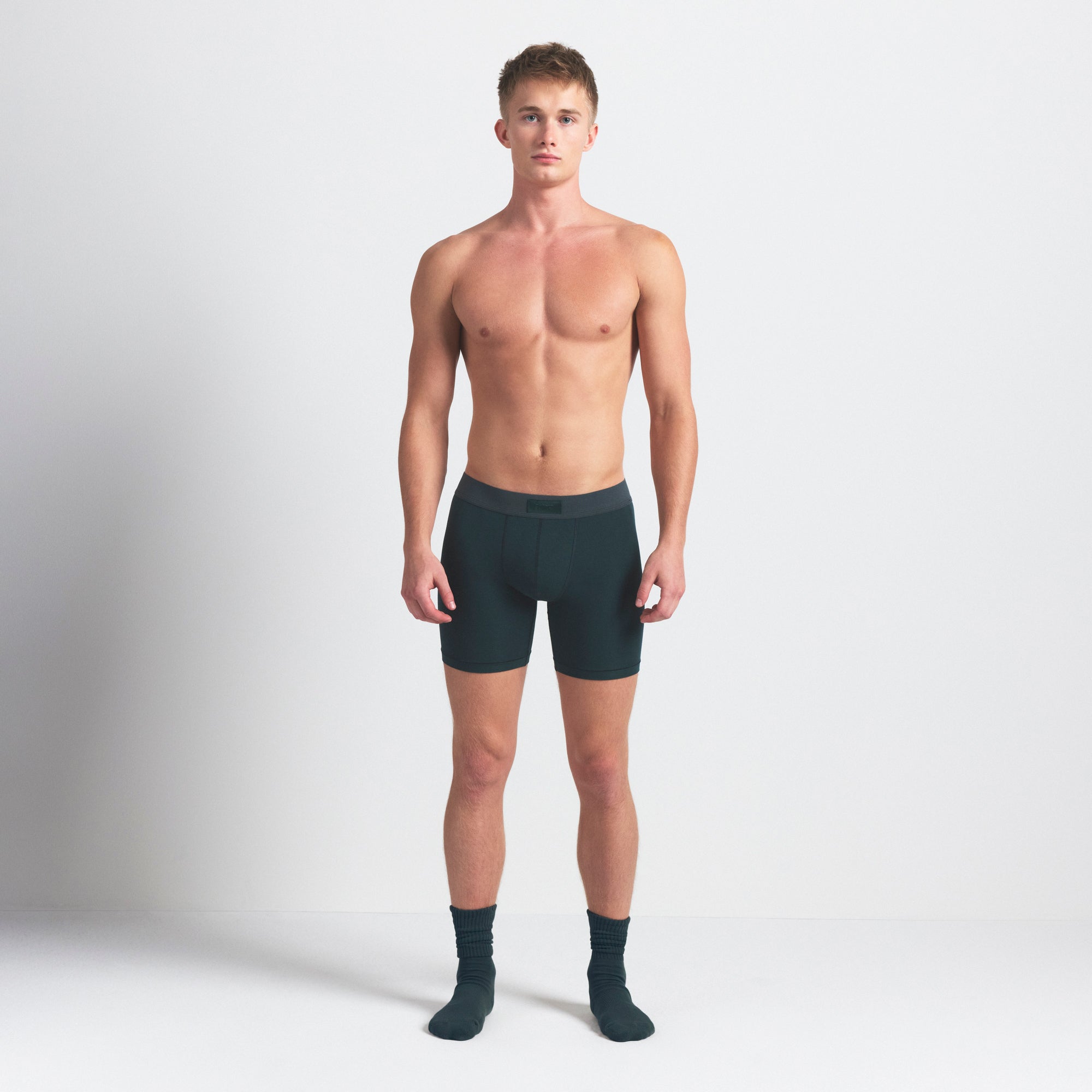 SKIMS COTTON MENS 5" BOXER BRIEF 5-PACK | BLUE BLACK STONE MULTI ON A MODEL FRONT VIEW @ | FOCUS: 0.0, 1.0, 0.9