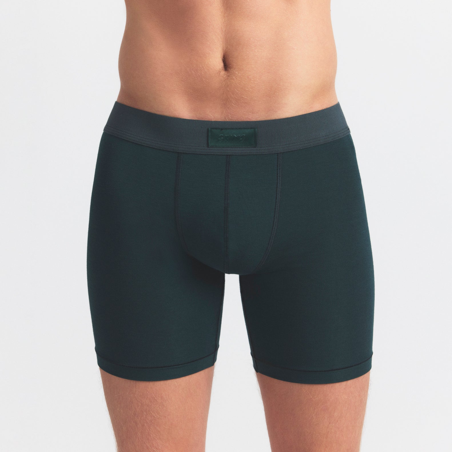 SKIMS COTTON MENS 5" BOXER BRIEF 5-PACK | BLUE BLACK STONE MULTI ON A MODEL SIDE VIEW @ | FOCUS: 0.0, 1.0, 0.9