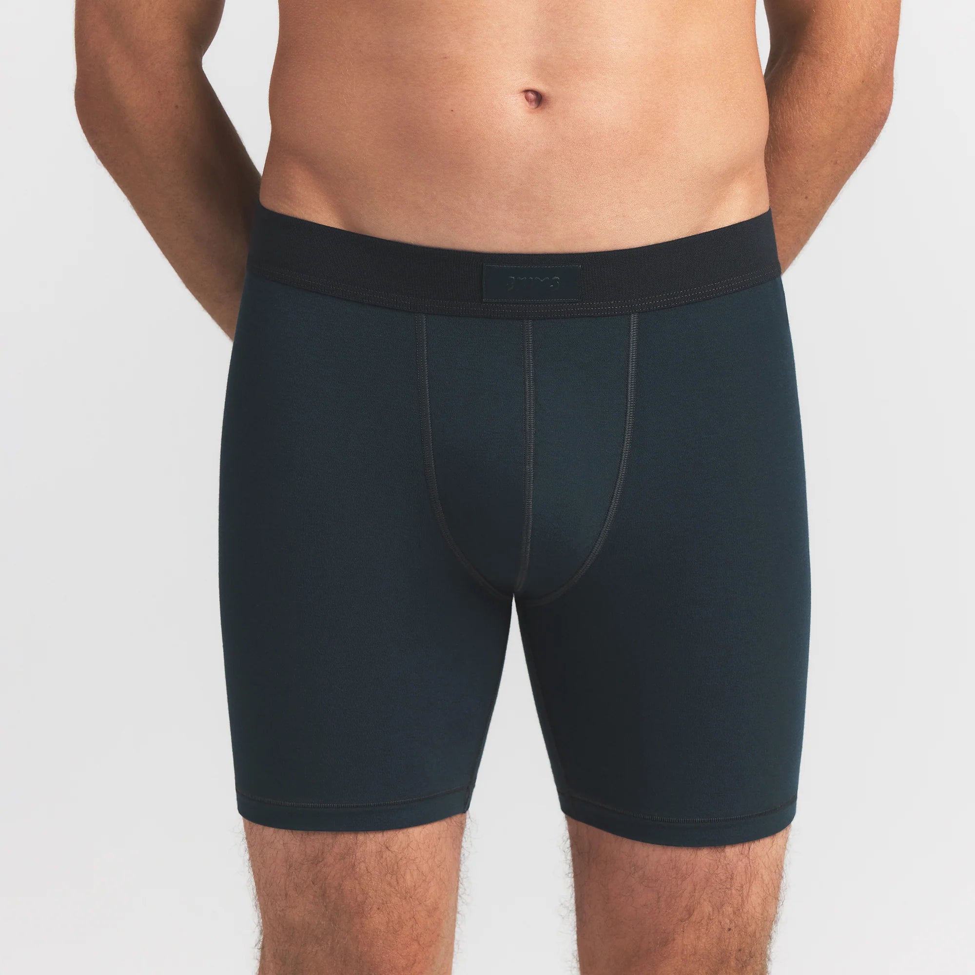 SKIMS COTTON MENS 5" BOXER BRIEF 5-PACK | VERDANT SKY MULTI ON A MODEL FRONT VIEW @ | FOCUS: 0.0, 1.0, 0.9