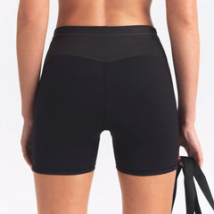 NikeSKIMS MATTE AND SHINE 5" BIKER SHORT | OBSIDIAN/IGNEOUS ON A MODEL SIDE VIEW @ | FOCUS: 0.0, 1.0, 0.9