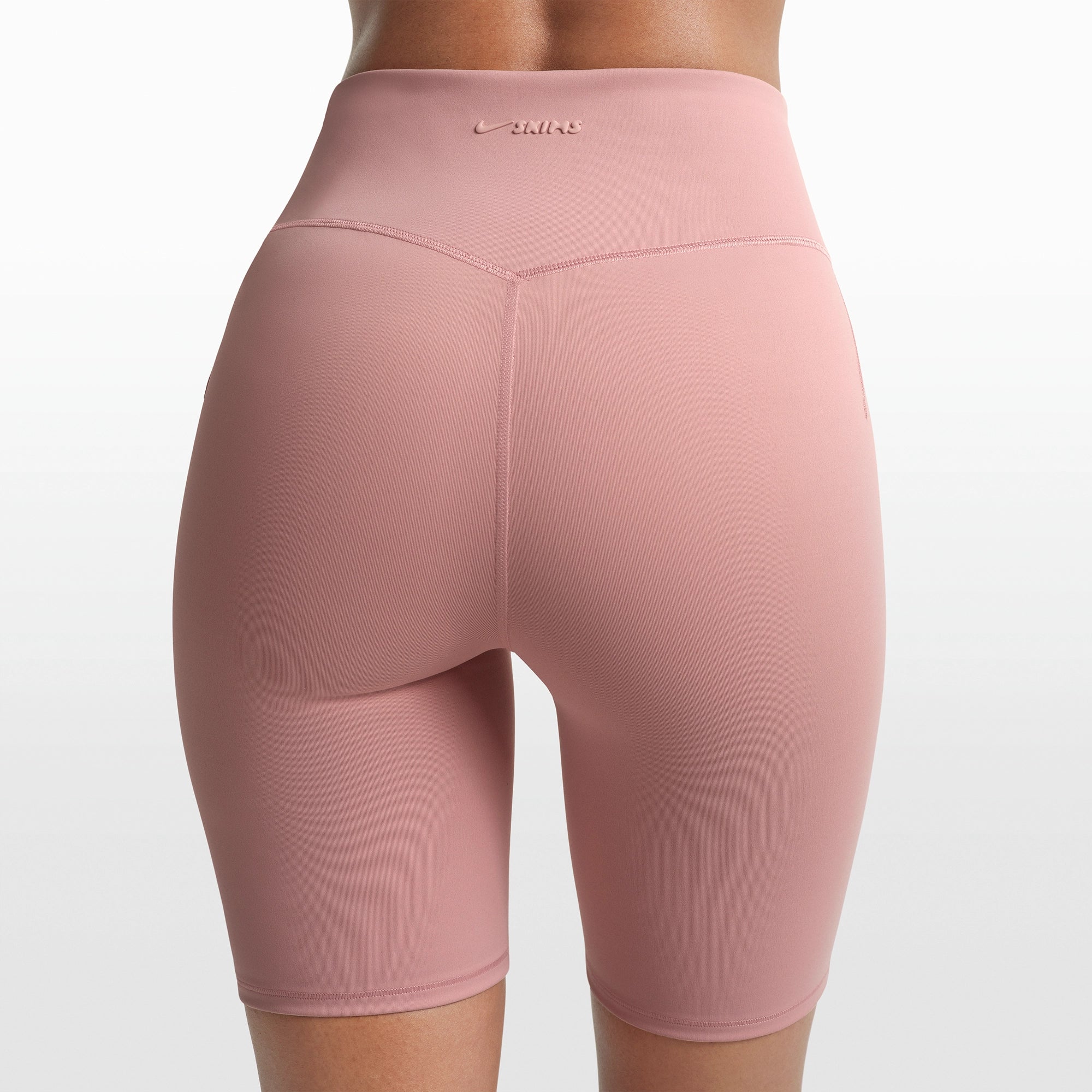 NikeSKIMS MATTE 7" BIKER SHORT | HIMALAYAN ON A MODEL FRONT VIEW @ | FOCUS: 0.0, 1.0, 0.9
