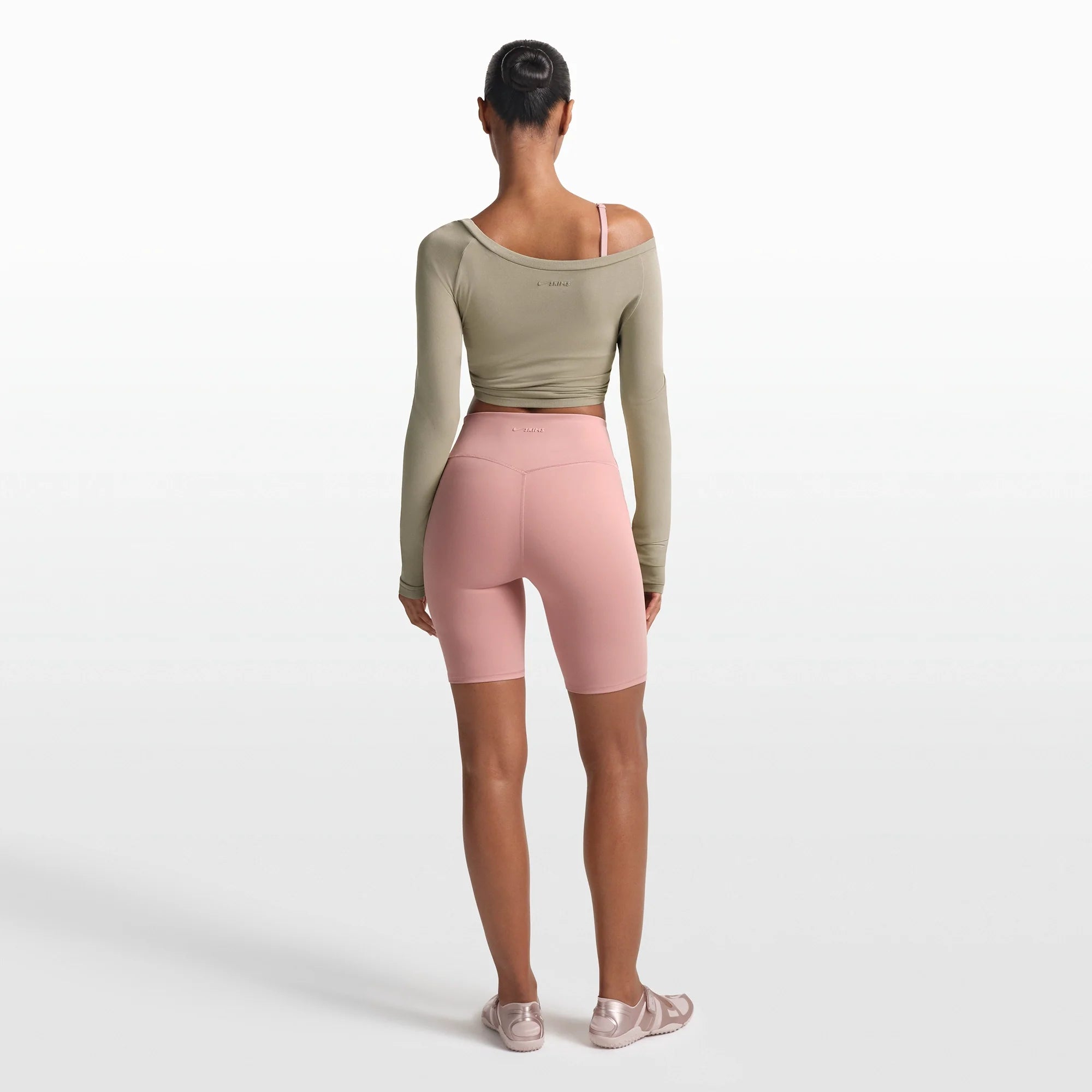 NikeSKIMS MATTE 7" BIKER SHORT | HIMALAYAN ON A MODEL FRONT VIEW @ | FOCUS: 0.0, 1.0, 0.9