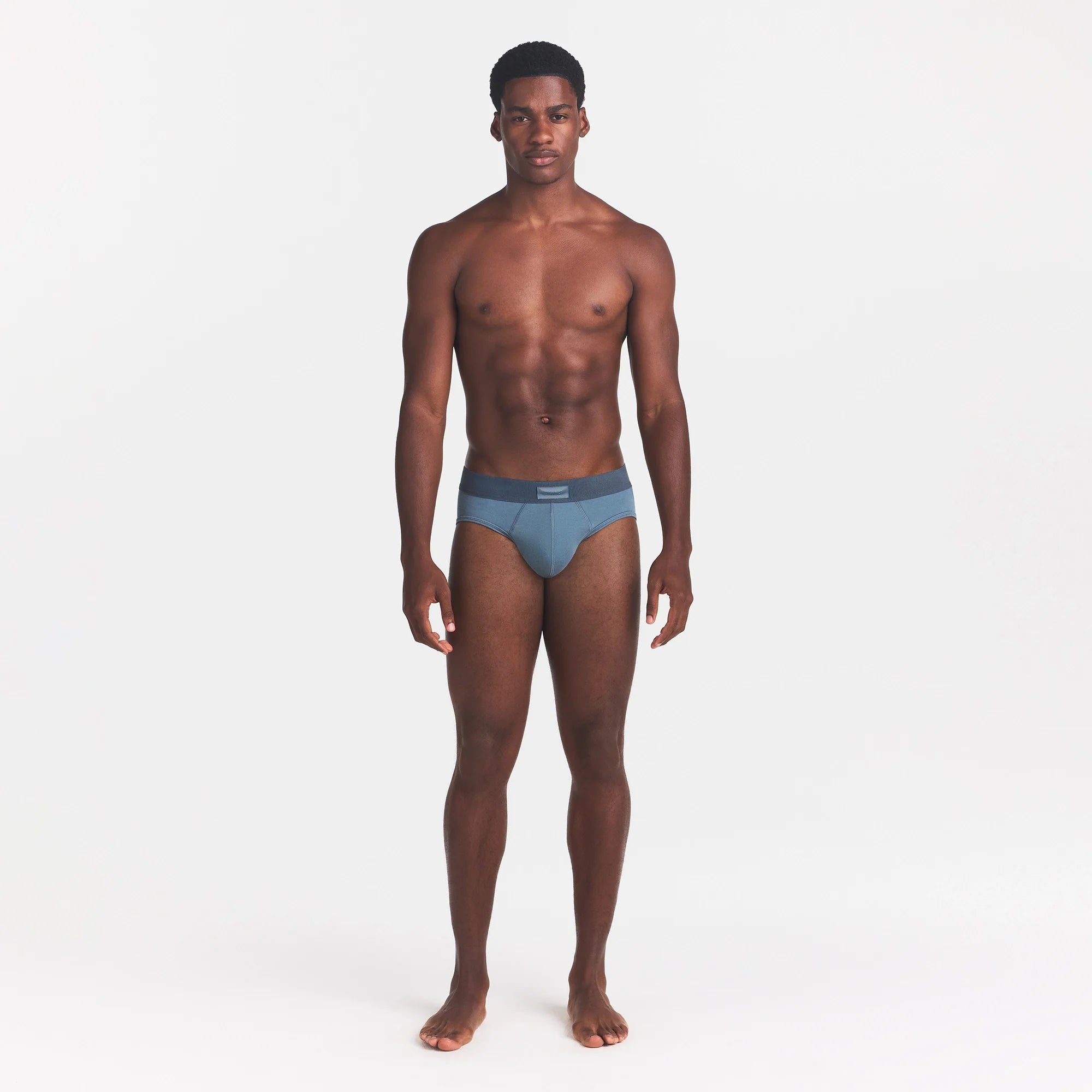 SKIMS COTTON MENS BRIEF | KYANITE ON A MODEL FRONT VIEW @ | FOCUS: 0.0, 1.0, 0.9