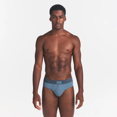 SKIMS COTTON MENS BRIEF | KYANITE ON A MODEL FRONT VIEW