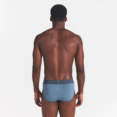 SKIMS COTTON MENS BRIEF | KYANITE ON A MODEL BACK VIEW
