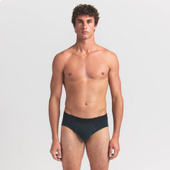 SKIMS COTTON MENS BRIEF | VERDANT ON A MODEL FRONT VIEW @ | FOCUS: 0.0, 1.0, 0.9