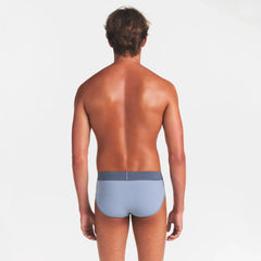 SKIMS COTTON MENS BRIEF 3-PACK | NIMBUS MULTI ON A MODEL BACK VIEW @ | FOCUS: 0.0, 1.0, 0.9