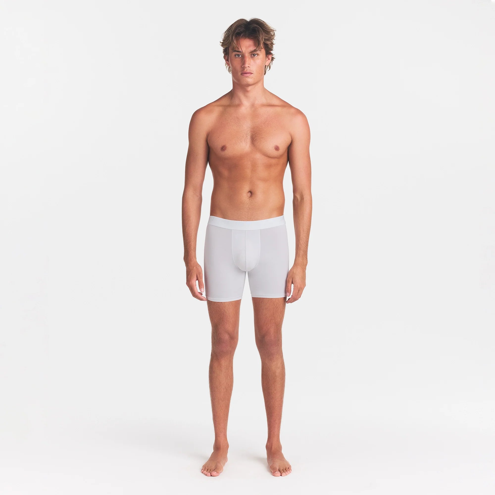 SKIMS STRETCH MENS 3" BOXER BRIEF | CHALK ON A MODEL FRONT VIEW @ | FOCUS: 0.0, 1.0, 0.9