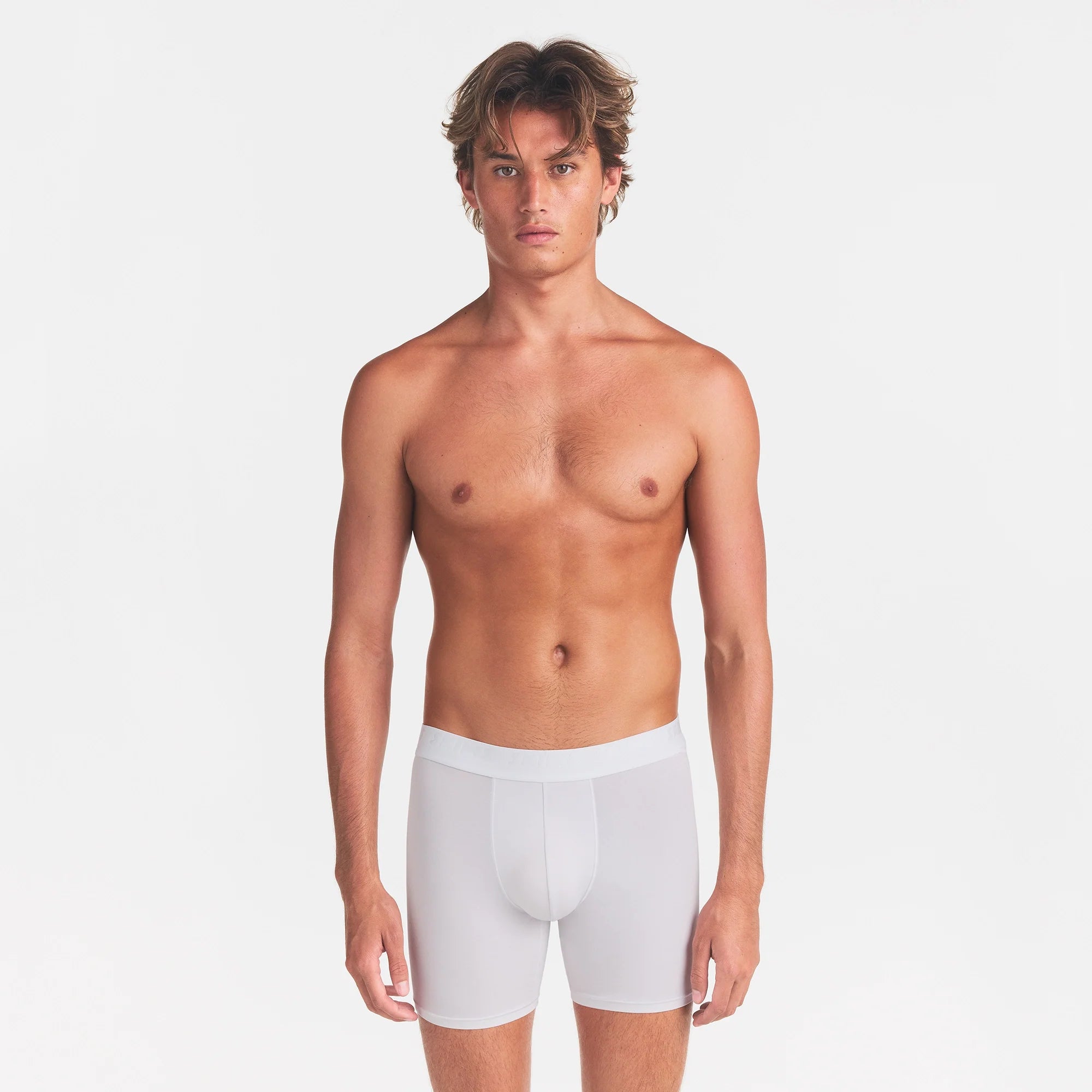 SKIMS STRETCH MENS 3" BOXER BRIEF | CHALK ON A MODEL FRONT VIEW