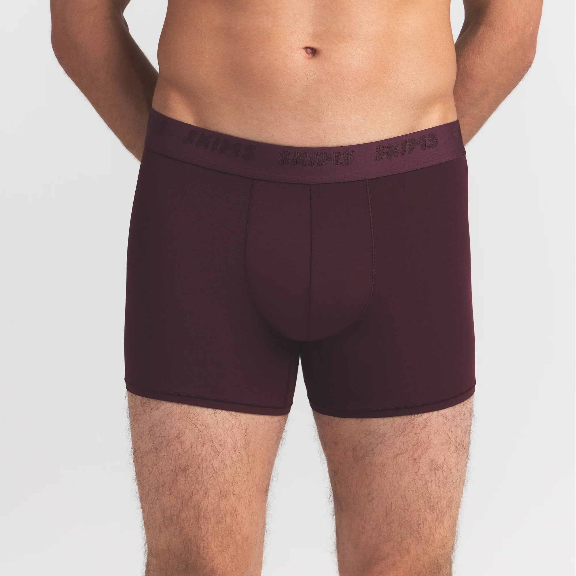 SKIMS STRETCH MENS 3" BOXER BRIEF | CURRANT ON A MODEL FRONT VIEW @ | FOCUS: 0.0, 1.0, 0.9