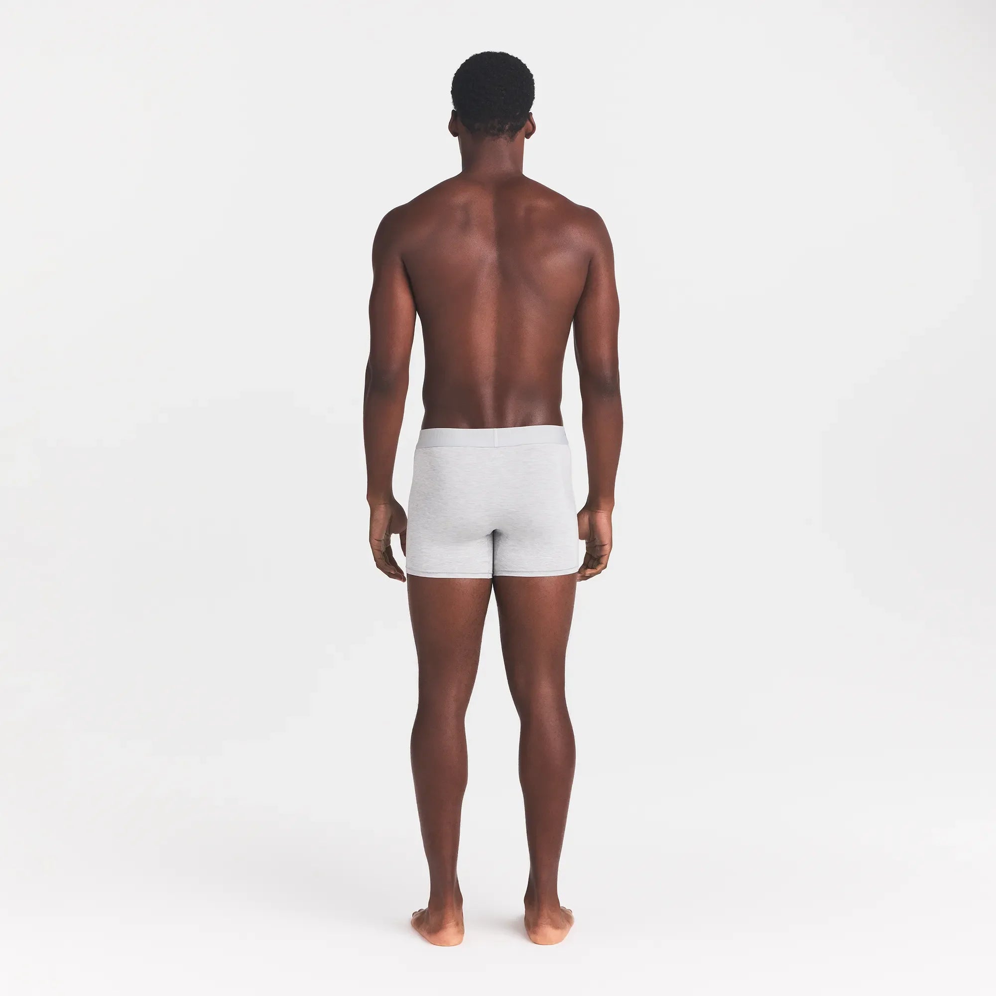 SKIMS STRETCH MENS 3" BOXER BRIEF | LIGHT HEATHER GREY ON A MODEL BACK VIEW @ | FOCUS: 0.0, 1.0, 0.9