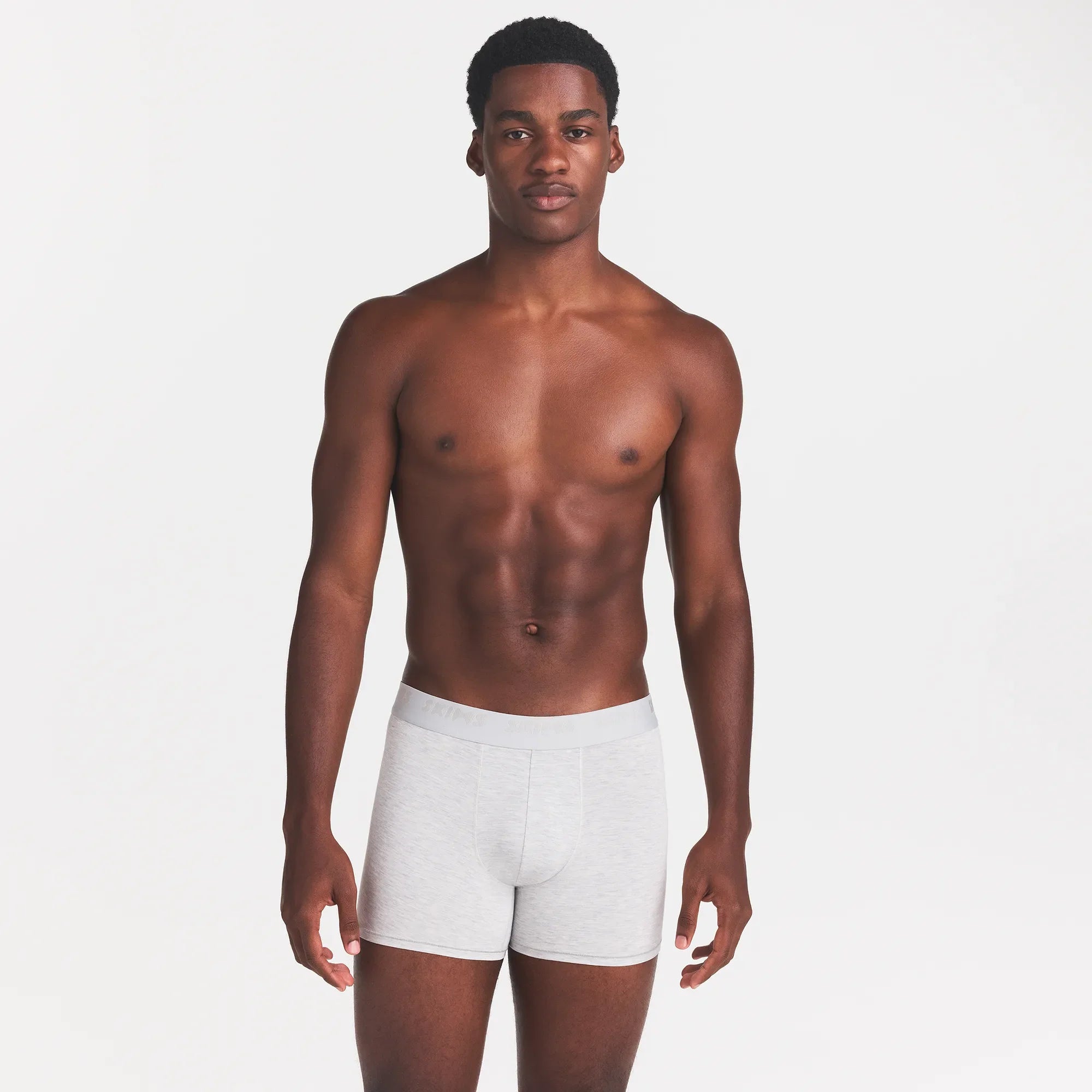 SKIMS STRETCH MENS 3" BOXER BRIEF | LIGHT HEATHER GREY ON A MODEL FRONT VIEW @ | FOCUS: 0.0, 1.0, 0.9