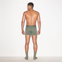 SKIMS STRETCH MENS 3 INCH BOXER BRIEF | LAUREL ON A MODEL FRONT VIEW | FOCUS: 0.0, 1.0, 0.9
