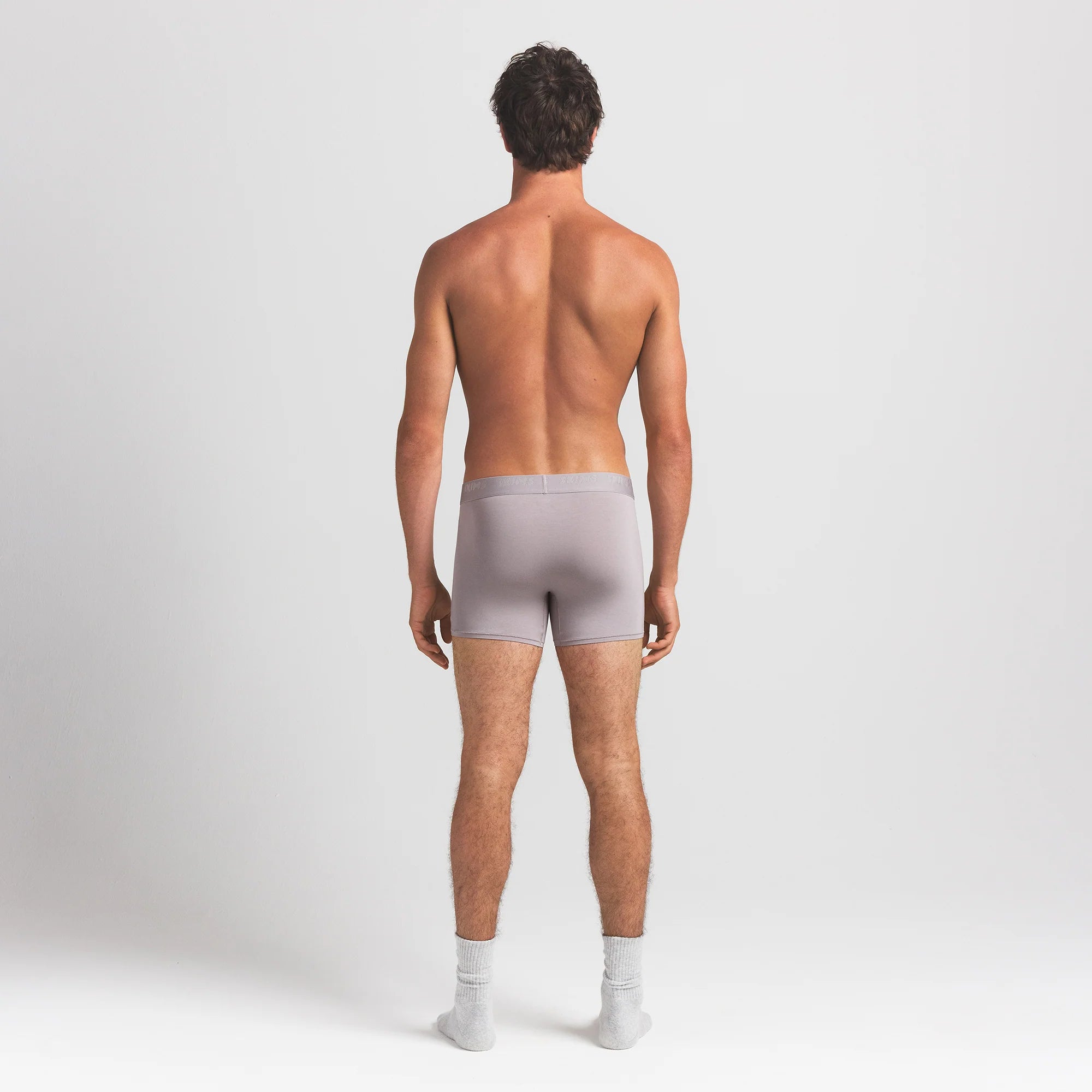 SKIMS STRETCH MENS 3" BOXER BRIEF | OYSTER ON A MODEL BACK VIEW @ | FOCUS: 0.0, 1.0, 0.9