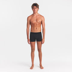 SKIMS COTTON MENS 3" BOXER BRIEF | ONYX ON A MODEL FRONT VIEW @ | FOCUS: 0.0, 1.0, 0.9