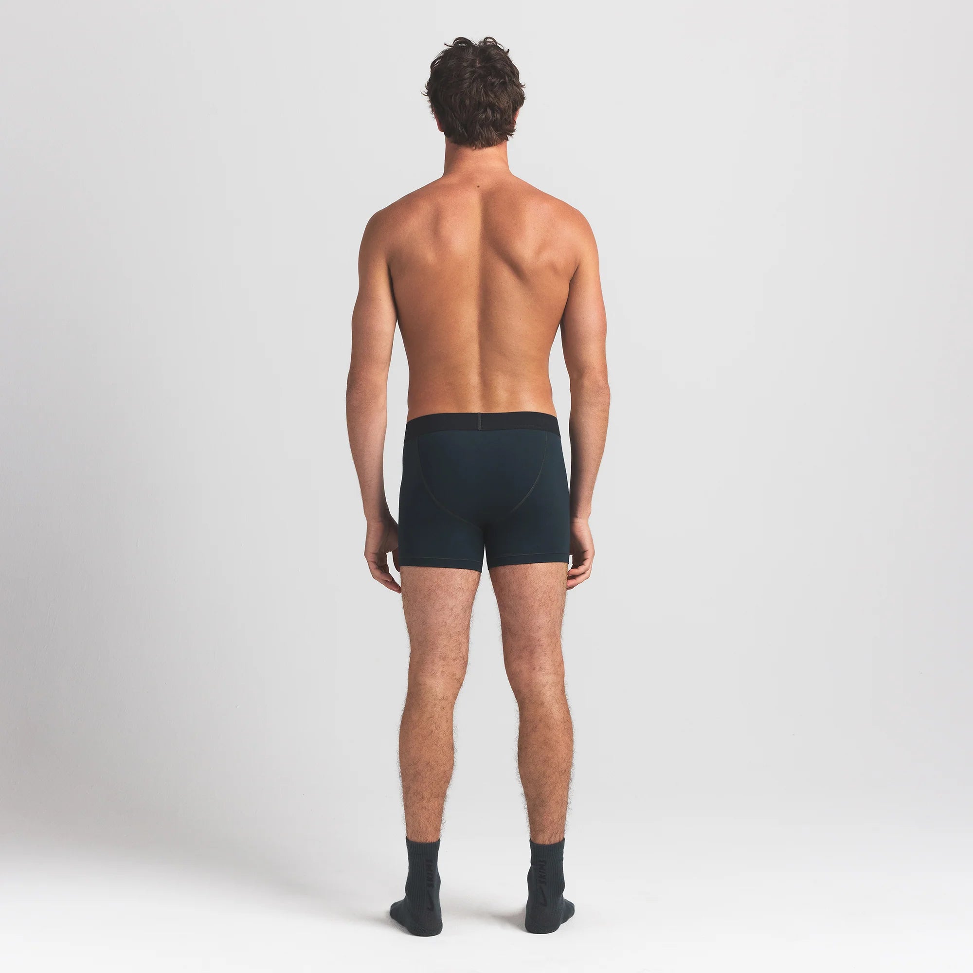 SKIMS COTTON MENS 3" BOXER BRIEF | VERDANT ON A MODEL BACK VIEW @ | FOCUS: 0.0, 1.0, 0.9