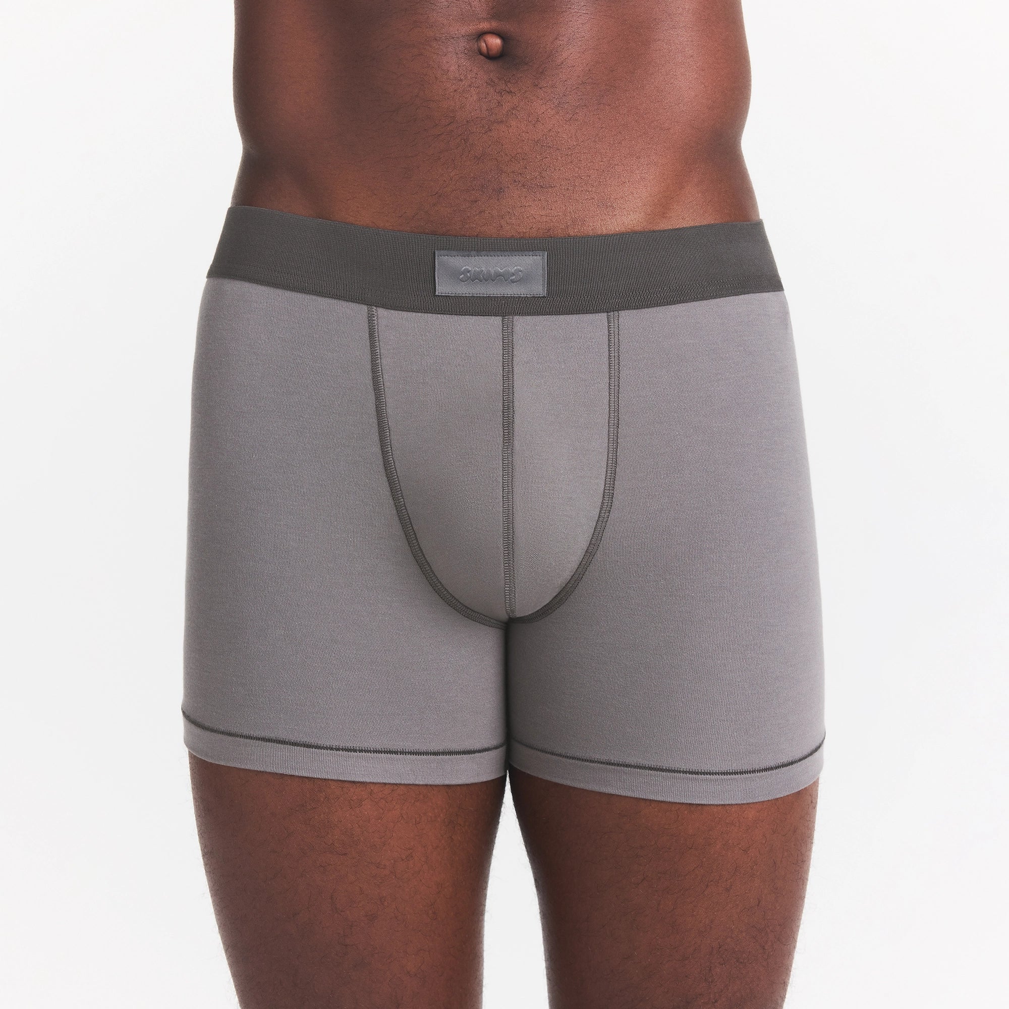 SKIMS COTTON MENS 3" BOXER BRIEF | WASHED GUNMETAL ON A MODEL FRONT VIEW