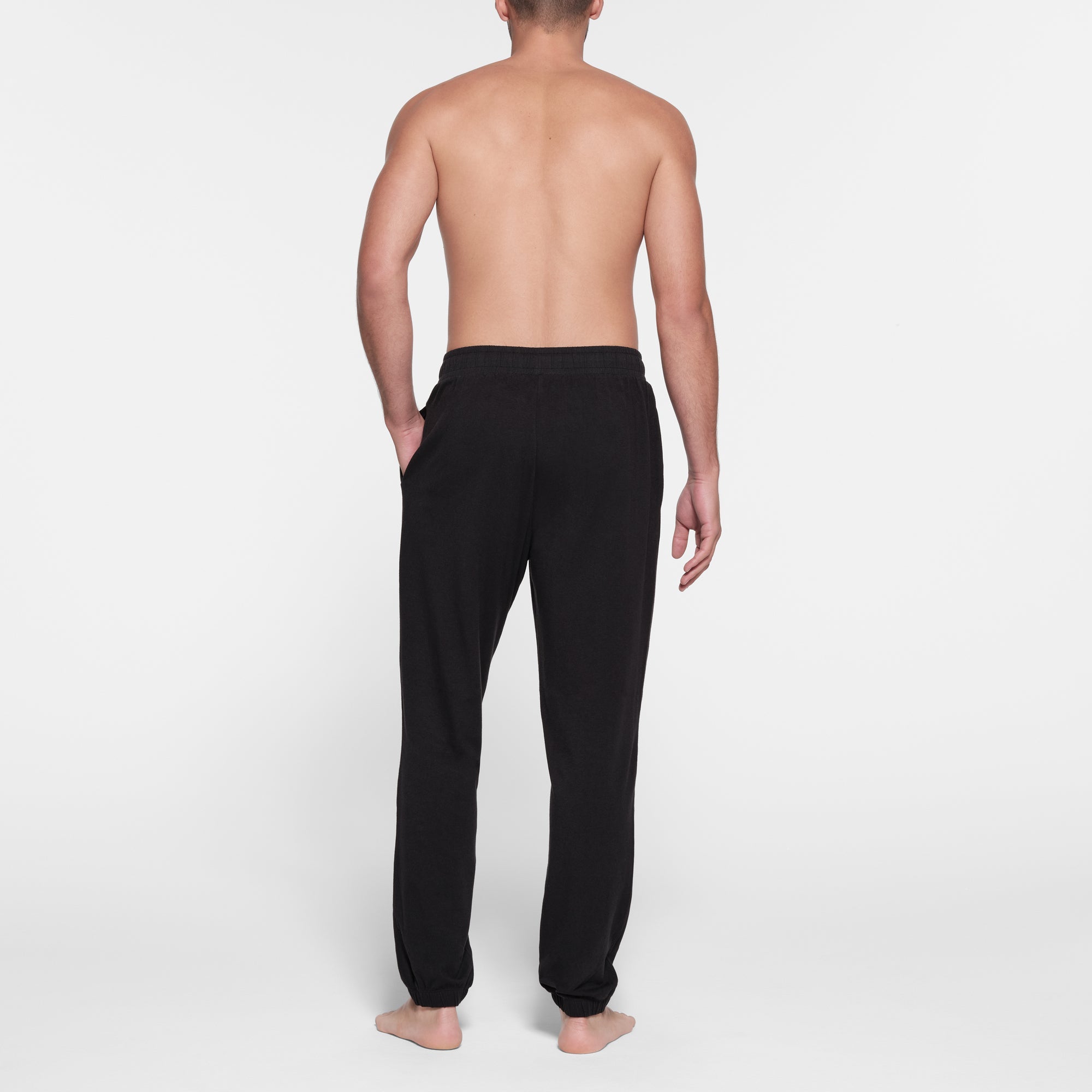 JERSEY LOUNGE MENS JOGGER | OBSIDIAN ON A MODEL BACK VIEW @ | FOCUS: 0.9, 0.1, 0.7