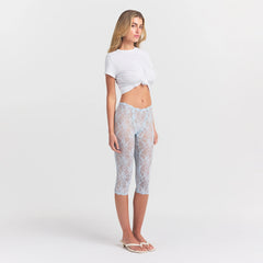 STRETCH LACE CAPRI | POWDER BLUE ON A MODEL SIDE VIEW @ | FOCUS: 0.0, 1.0, 0.9
