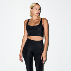 NikeSKIMS SHINE V-LINE 26" LEGGING | OBSIDIAN ON A MODEL SIDE VIEW @ | FOCUS: 0.0, 1.0, 0.9