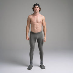 SKIMS SPORT MENS LEGGING | GUNMETAL ON A MODEL FRONT VIEW | FOCUS: 0.0, 1.0, 0.9