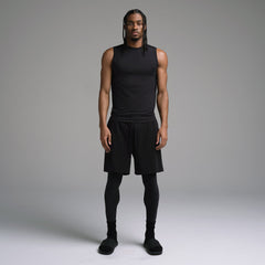 SKIMS SPORT MENS LEGGING | OBSIDIAN ON A MODEL FRONT VIEW | FOCUS: 0.0, 1.0, 0.9