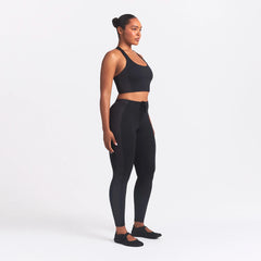 NikeSKIMS MATTE AND SHINE 26" LEGGING | OBSIDIAN/IGNEOUS ON A MODEL SIDE VIEW @ | FOCUS: 0.0, 1.0, 0.9