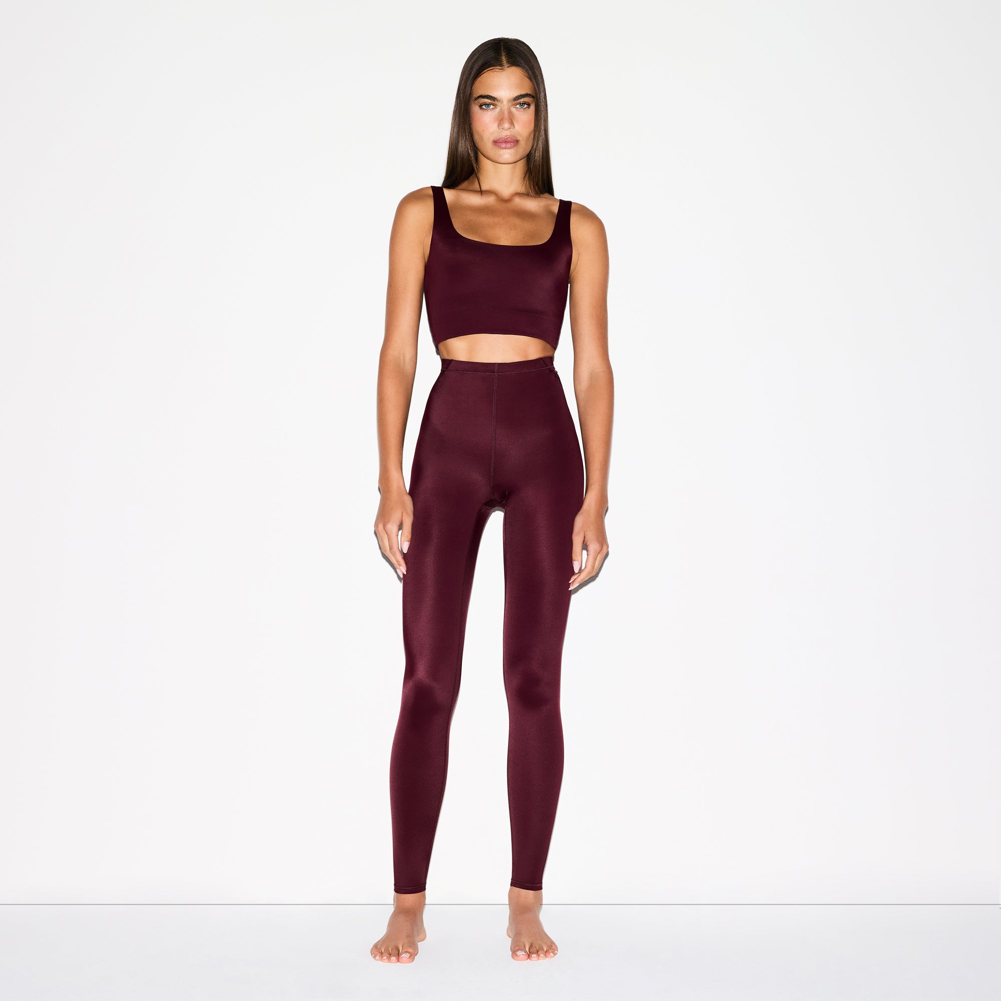 NikeSKIMS SHINE DRAWCORD 26" LEGGING | CURRANT ON A MODEL FRONT VIEW @ | FOCUS: 0.0, 1.0, 0.9