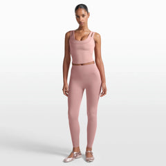 NikeSKIMS MATTE 26" LEGGING | HIMALAYAN ON A MODEL FRONT VIEW @ | FOCUS: 0.0, 1.0, 0.9