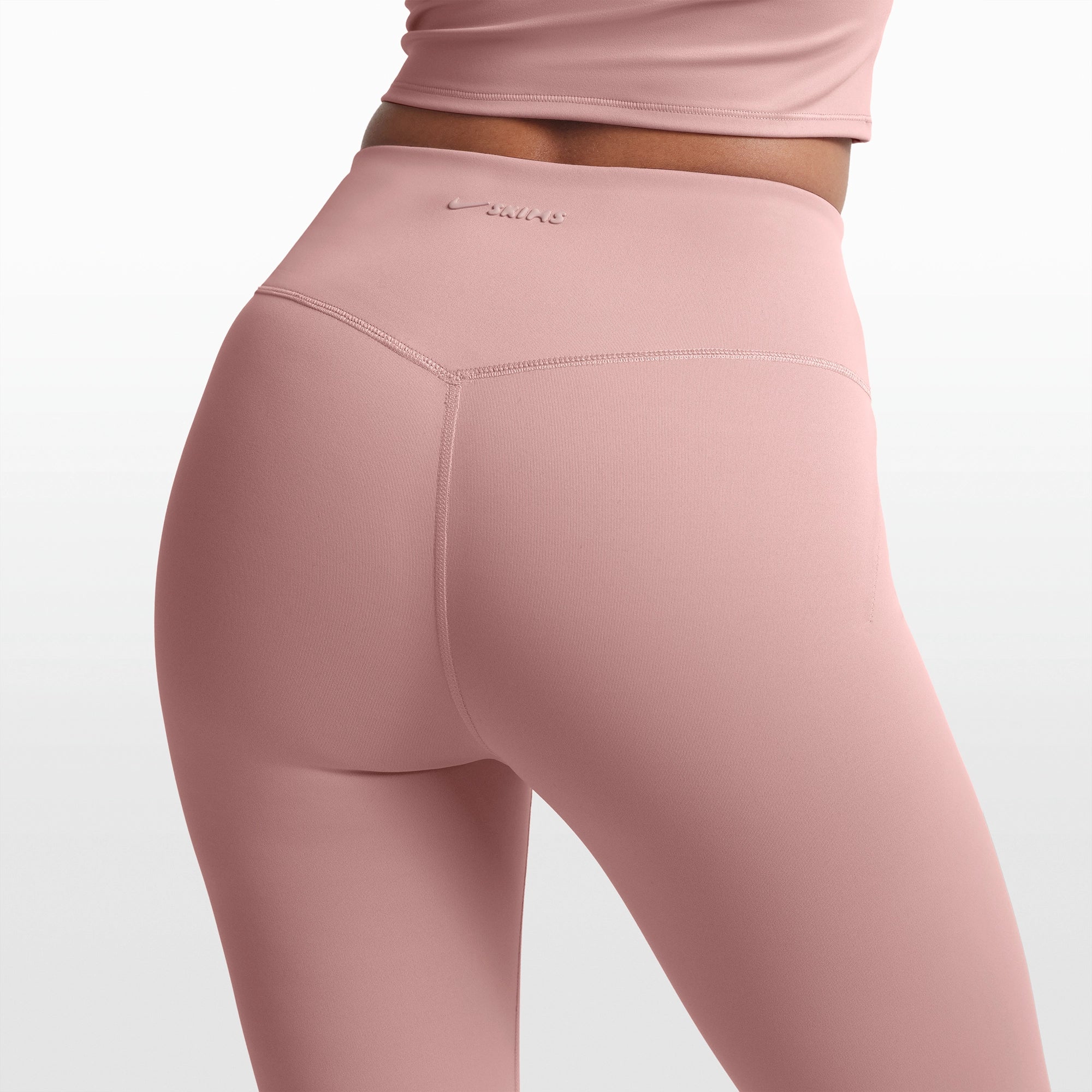 NikeSKIMS MATTE 26" LEGGING | HIMALAYAN ON A MODEL FRONT VIEW @ | FOCUS: 0.0, 1.0, 0.9