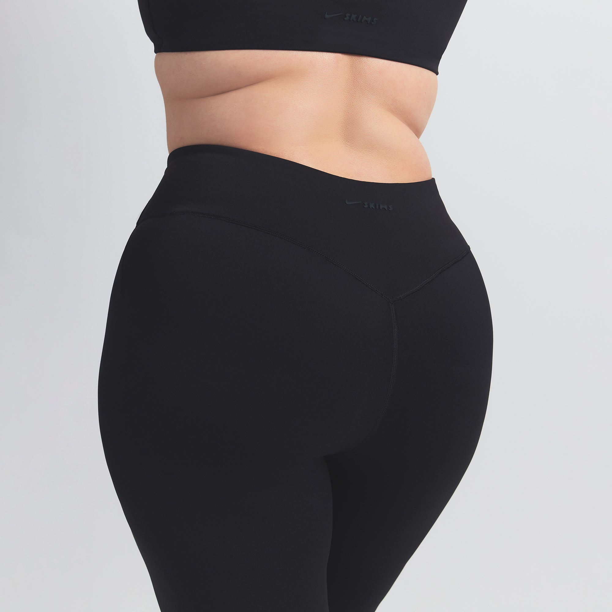 NikeSKIMS MATTE 26" LEGGING | OBSIDIAN ON A MODEL BACK VIEW