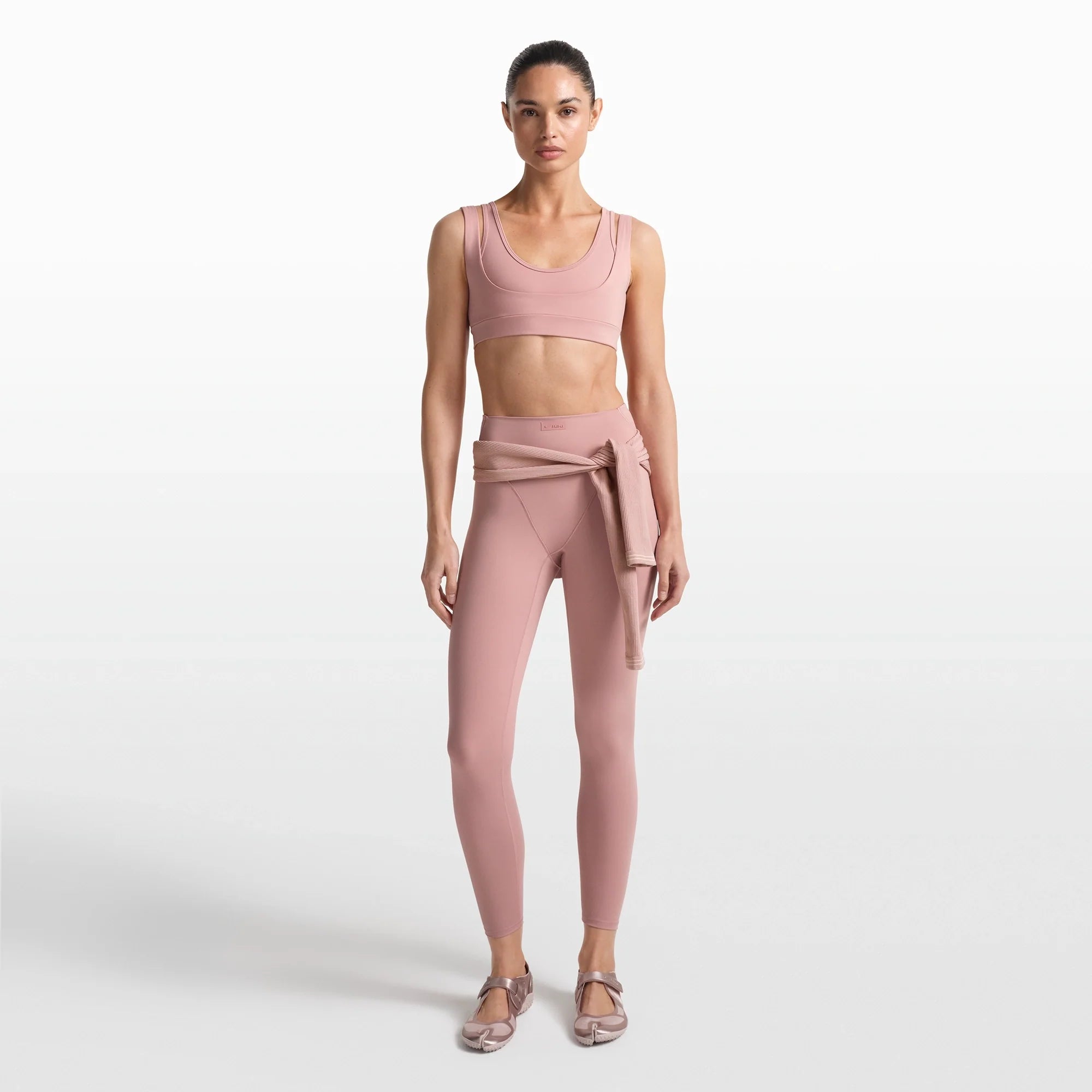 NikeSKIMS MATTE V-LINE 26" LEGGING | HIMALAYAN ON A MODEL FRONT VIEW @ | FOCUS: 0.0, 1.0, 0.9
