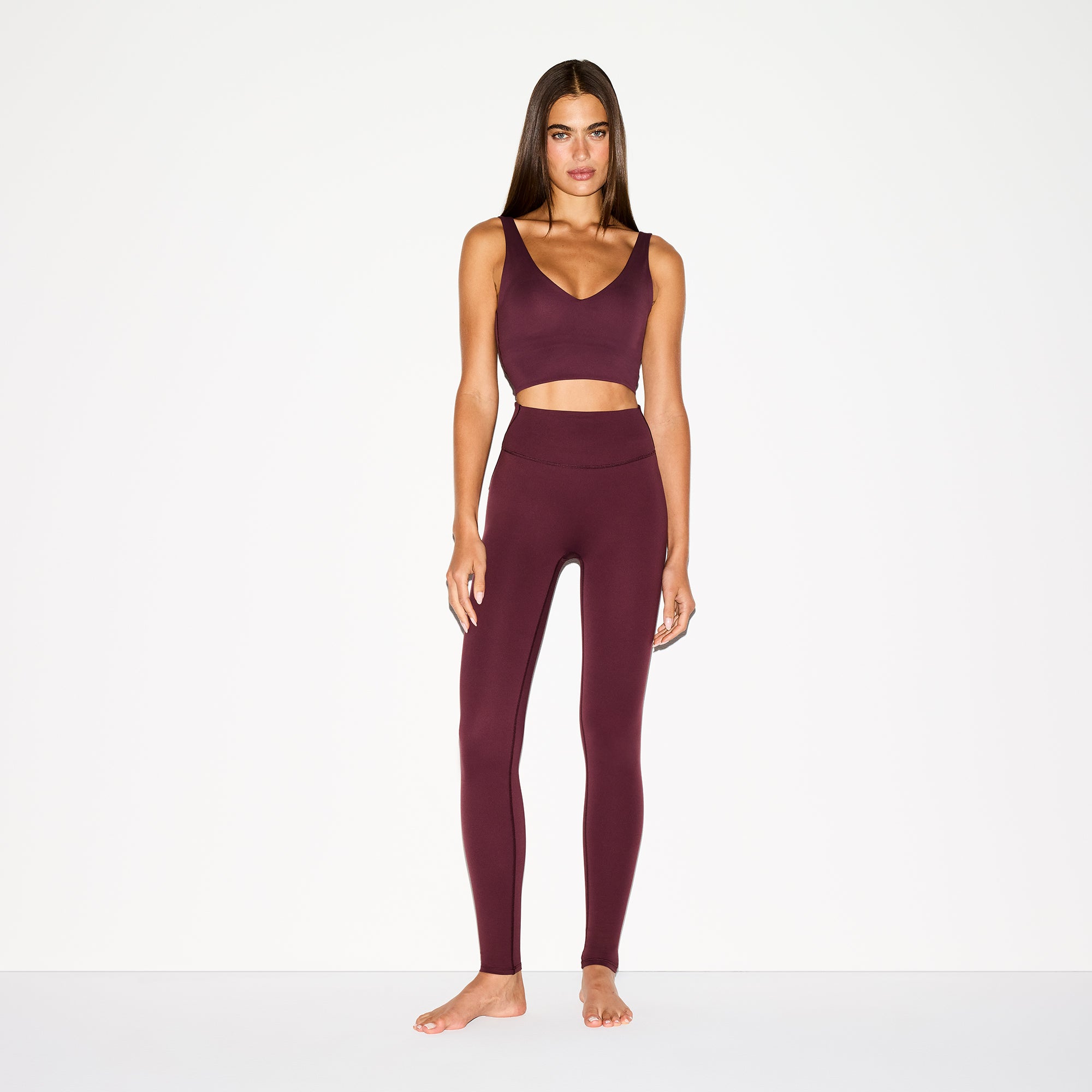 NikeSKIMS MATTE 29" LEGGING | CURRANT ON A MODEL FRONT VIEW @ | FOCUS: 0.0, 1.0, 0.9