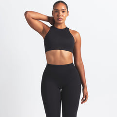 NikeSKIMS MATTE FOOTSIE GRIP LEGGING | OBSIDIAN ON A MODEL FRONT VIEW @ | FOCUS: 0.0, 1.0, 0.9
