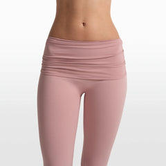 NikeSKIMS MATTE FOLDOVER SLIM FLARE LEGGING | HIMALAYAN ON A MODEL FRONT VIEW @ | FOCUS: 0.0, 1.0, 0.9