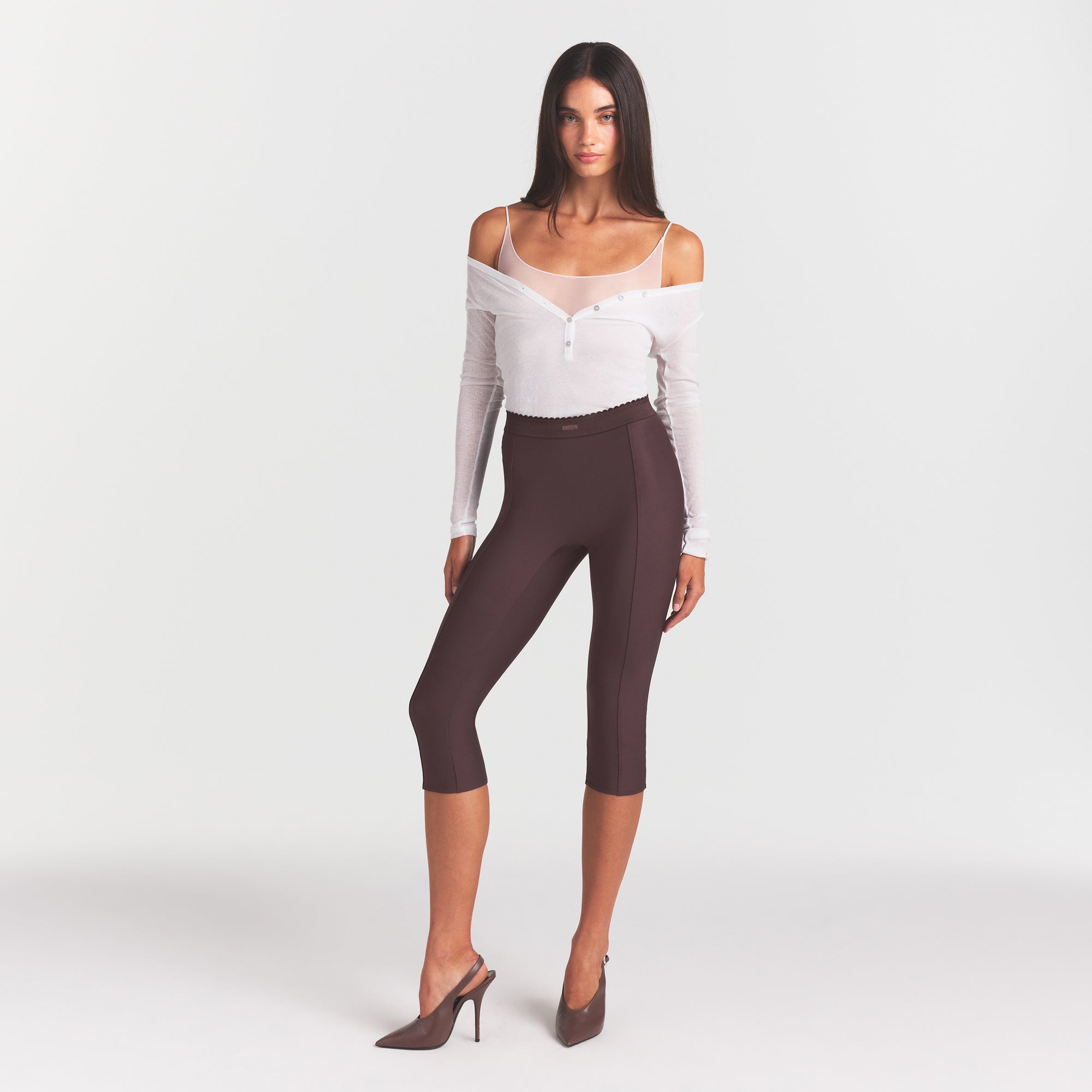 SKIMS BODY HIGH-WAISTED CAPRI | RAISIN ON A MODEL FRONT VIEW @